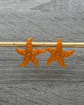 Boucles d'oreille fleurs dorées pailletées